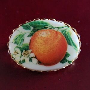 Elegant Gold and Orange Fruit Brooch